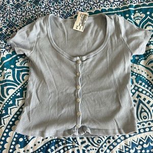 LIGHT BLUE CROP TOP BUTTON UP